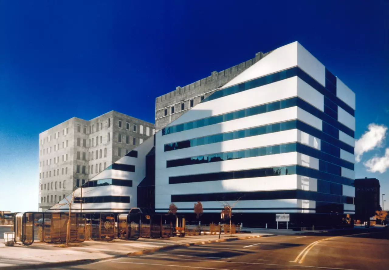 before and after views of the 50 Monroe Place building in Grand Rapids, Michigan, USA