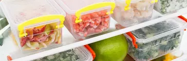 Frozen food in the refrigerator. Vegetables on the freezer shelves. Stocks of meal for the winter.