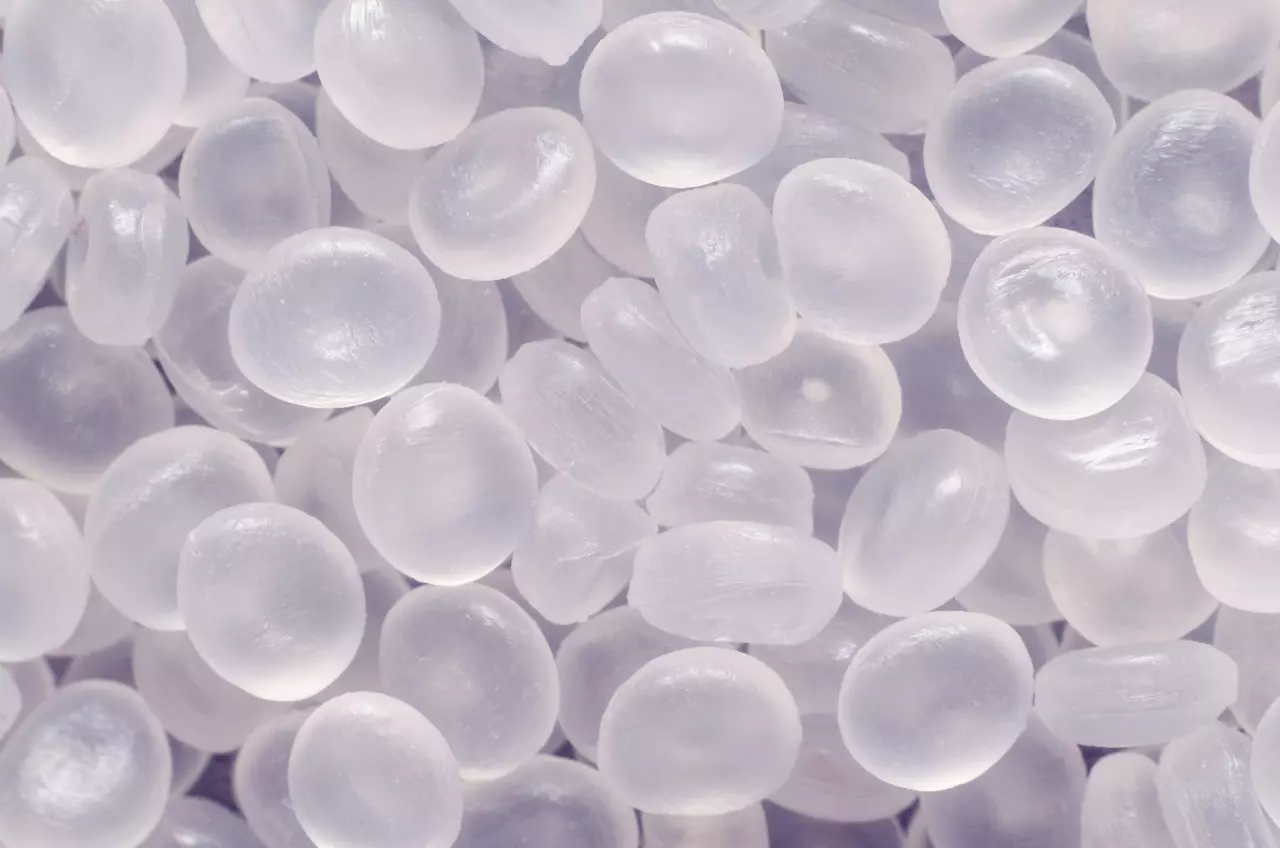 Polypropylene granule close-up background texture 