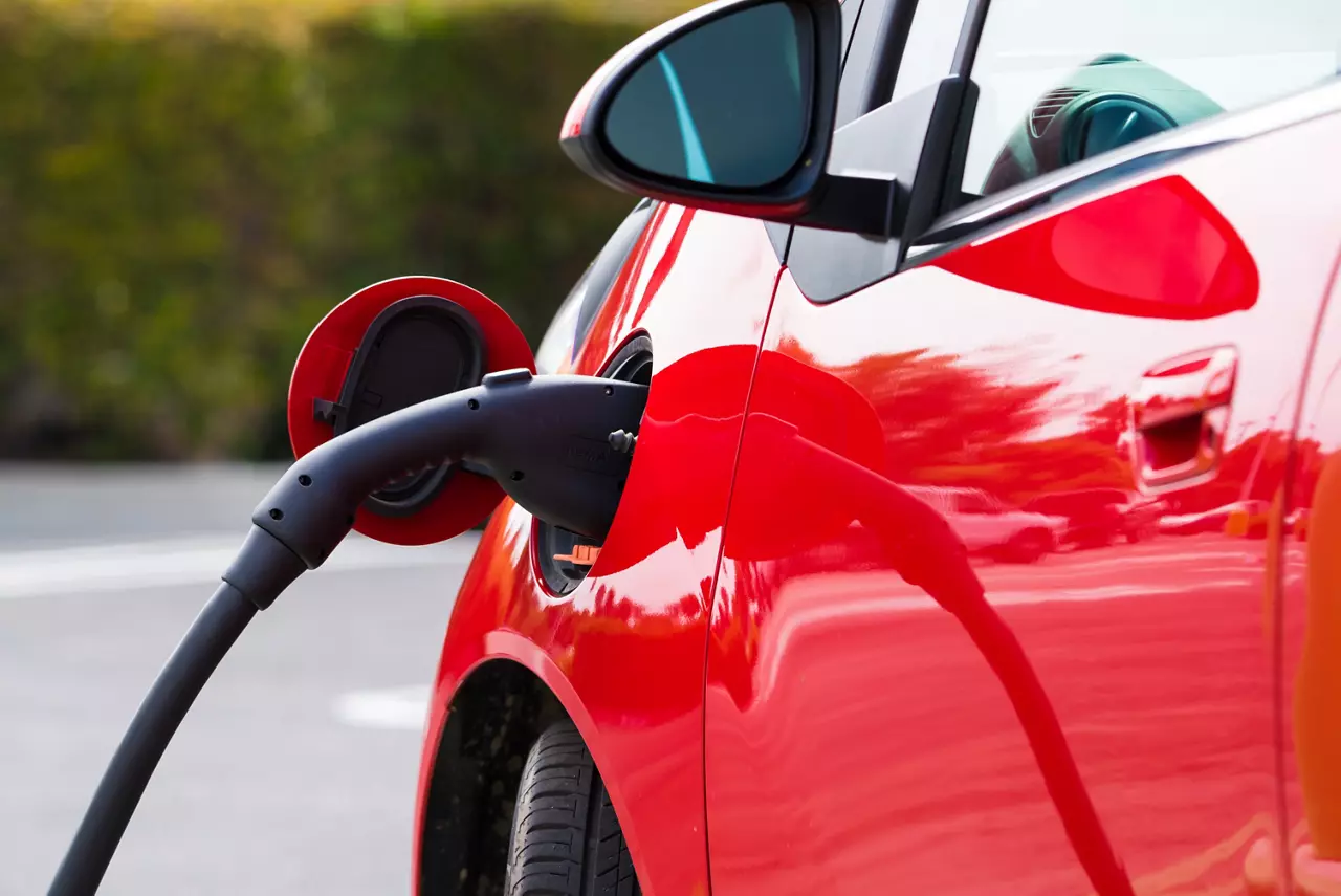 Red electric car charging