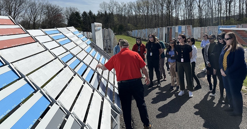 art students inspect paint samples