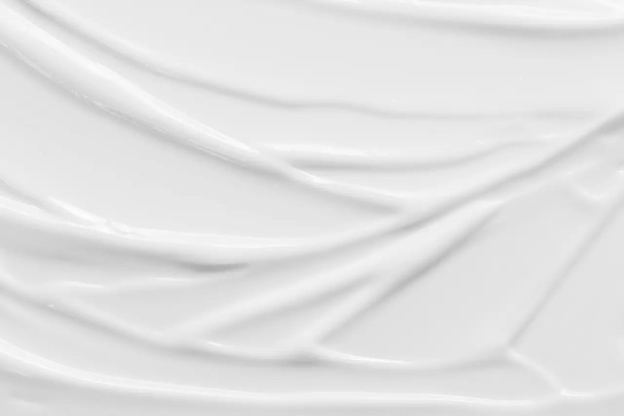 Beauty cream texture. White lotion; moisturizer; skincare product textured background