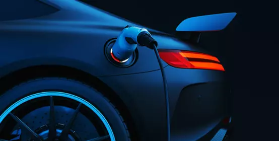 EV Electric car silhouette with low battery charging at electric charge station. 3d render and illustration.