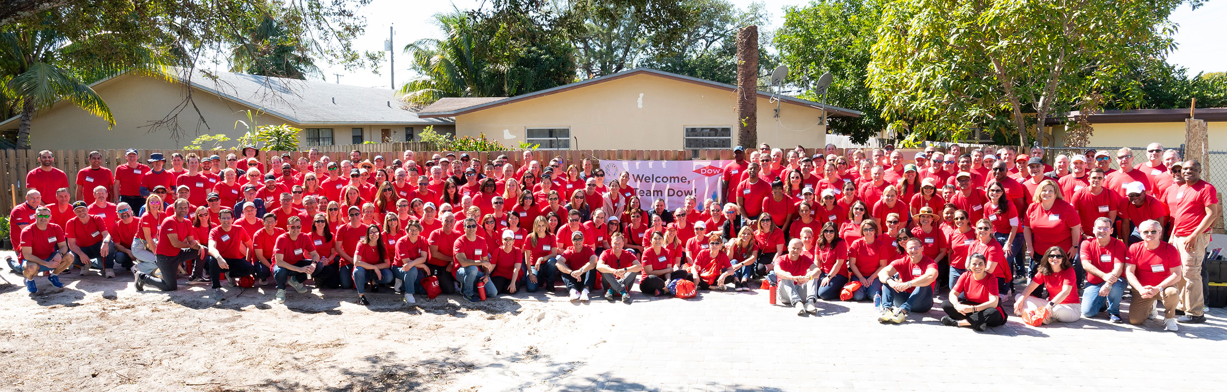 Large group photo of Dow volunteers at LEAD event