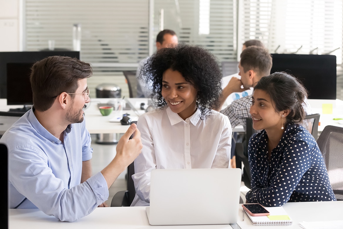 group of people around computer